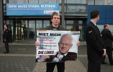 Sagel mit R?ttgers-Plakat